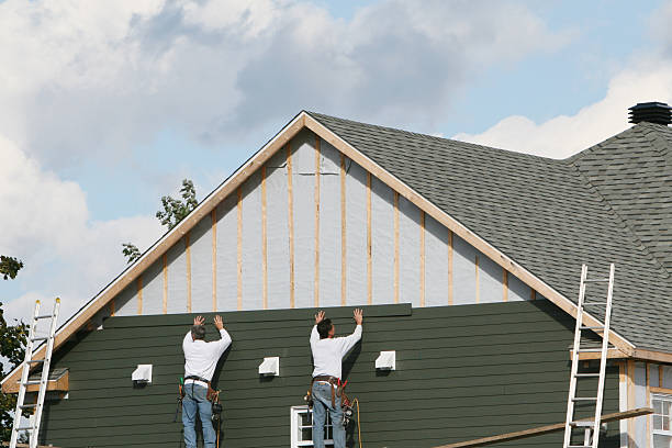 Professional Storm Damage Siding Repair technician working in Gloucester Point, VA